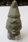A Nino Garden Gnome by Plato in grey (13x10x36 cm (5’’x 4’’x14’’)).