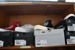 Five pairs of assorted as new Converse footwear.