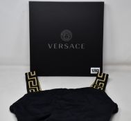 An as new Versace one piece swimsuit (TG 3/UK M).