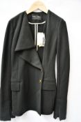 An as new Proenza Schouler Asymmetrical Lapel blazer in black (Size US 4 - RRP £693).