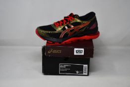 A pair of women's as new Asics Gel-Nimbus 21 trainers (UK 7).