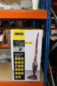 Three new Zanussi Red Handy Go 2 in 1, 95W, 0.55L rechargeable cordless vacuum cleaners (ZANDX75).