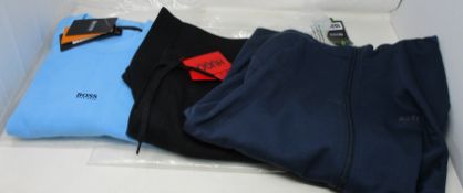A pair of as new Hugo Boss shorts (L), sweatshirt (L) and hooded full zip jacket (L).