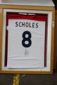 A pre-owned Paul Scholes signed Manchester United 8 shirt (Caution broken glass, item is slightly