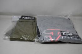 As new Fox clothing; Defend long sleeve jersey (M) and shorts (34