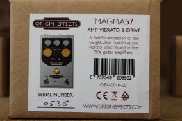 A boxed as new Origin Effects Magma57 Amp Vibrato and Drive.