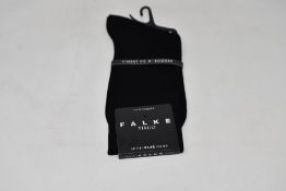 A quantity of as new Falke Firenze socks in black (18 pairs - RRP £18 each).