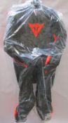 An as new Dainese Laguna Seca 5 Leather Suit in Black/Fluo-Red (Size: 58).