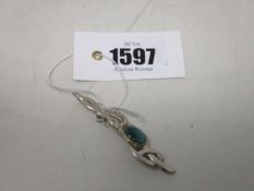 A silver Paul Edward Bunn Lapidary brooch.