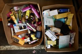 Two boxes of as new luxury toiletries and beauty products to include Chanel, Victoria Secrets and
