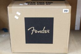 A boxed as new Fender Mustang LT25 Combo Amp.