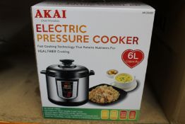 Four new AKAI Electric 6L steam, bake, saute, stew pressure cookers (AKCK601).