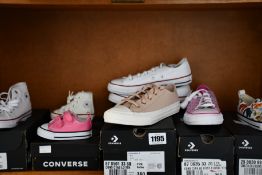 Seven pairs of assorted toddler/junior/youth as new Converse footwear (One pair unboxed).