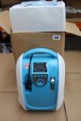 An as new Geni-Store portable car oxygen concentrator (RRP £1000) (Requires UK plug adaptor).
