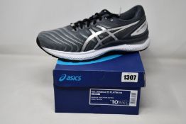 A pair of men's as new Asics Gel-Nimbus 22 Platinum trainers (UK 9.5).