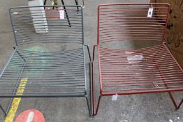 Two Hay Hee Lounge Chairs (Grey and rust).
