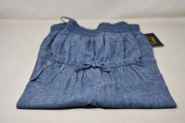 Seven girls Ralph Lauren indigo blue smock rompers (Assorted sizes).