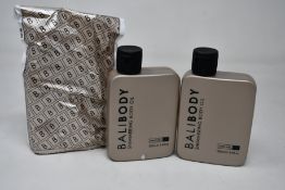 A quantity of BaliBody Shimmering body oils (100ml each) (Approximately 55 items).