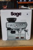 A boxed as new Sage The Barista Express espresso coffee machine.