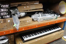 A large quantity of miscellaneous music related items to include Evans drum heads, piano benches,