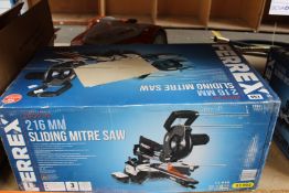 A boxed as new Ferrex Sliding Mitre Saw (2000W, 216mm).