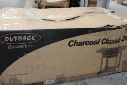 An Outback Barbeques Charcoal Classic 2000 (Some damage to box).