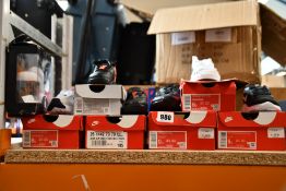 Seven pairs of assorted infants/children's as new Nike trainers (One pair has black mark, requires
