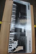 A boxed as new Yamaha PSR-EW410 digital keyboard.