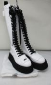 A pair of pre-owned GCDS contrast sole knee boots in white (EU 39 - Good condition).
