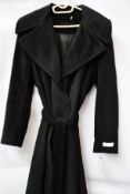 An as new Calvin Klein coat in black (S).