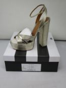A pair of as new Aquazzura Sundance Platinum 140 shoes (EU 39.5).