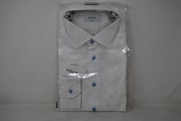 An as new Eton shirt in white (Size 17 - RRP £170).