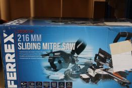 A boxed as new Ferrex Sliding Mitre Saw (2000W, 216mm).