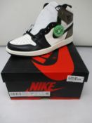 A pair of as new Nike Jordan 1 Retro Dark Mocha with authentication tag (UK 6).