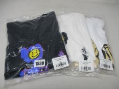Three as new Kaws T-shirts; Skeleton New Fiction Bone (L) and two Kaws x Cactus Plant Flea Market (