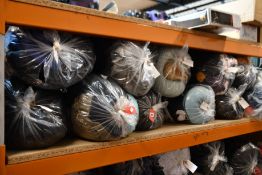 Eleven bags of assorted pre-owned clothing and related items.