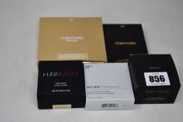 A Tom Ford eye colour quad, Tom Ford Soleil contouring compact, Laura Mercier translucent loose