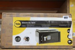Two boxed as new Yale electronic laptop safes.