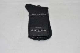 A quantity of as new Falke Tiago socks (24 pairs- RRP £16 each).