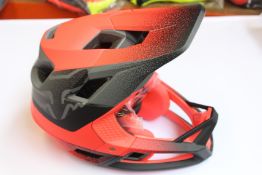 An as new Fox Racing ProFrame Helmet Vapor in red and black (M).