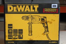 A DeWalt 1300W Corded Percussion Drill D21570K.