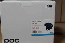 A boxed as new POC Obex Spin helmet in lead blue (Size medium/large).