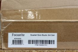 A boxed as new Focusrite Scarlett Solo Studio (3rd Gen) USB Interface.