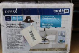 A Brother PE535 computerized embroidery machine.