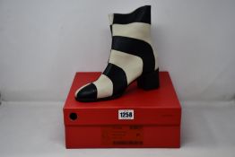 A pair of as new Arche Teobiz boots (EU 39).