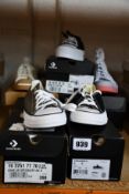Five pairs of assorted as new Converse sneakers.