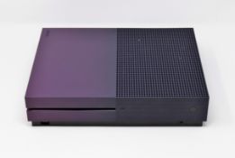A pre-owned Xbox One S 1TB fortnight edition games console (model 1681) in purple (console unit