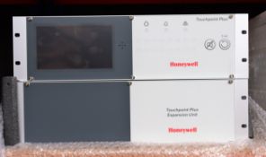 A pre-owned HoneywellTouchpoint Plus 19