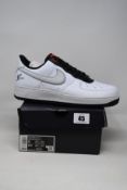 A pair of as new Nike Air Force 1 '07 LX (UK 7).