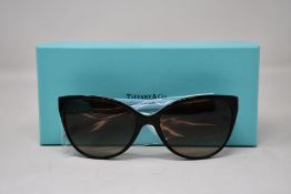 A pair of as new Tiffany & Co sunglasses.